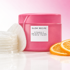 Glow Recipe Vitamin C Brightening Toner Pads jar beside a stack of pads